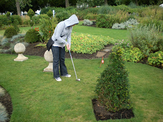 Emily playing the Adventure Golf Grass Putting course at Hyde Park, London.