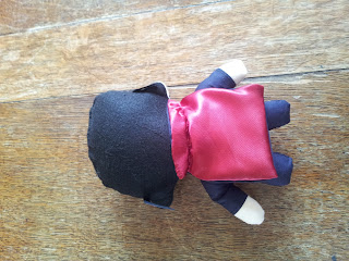 Back view of Elvis to show the red cape off