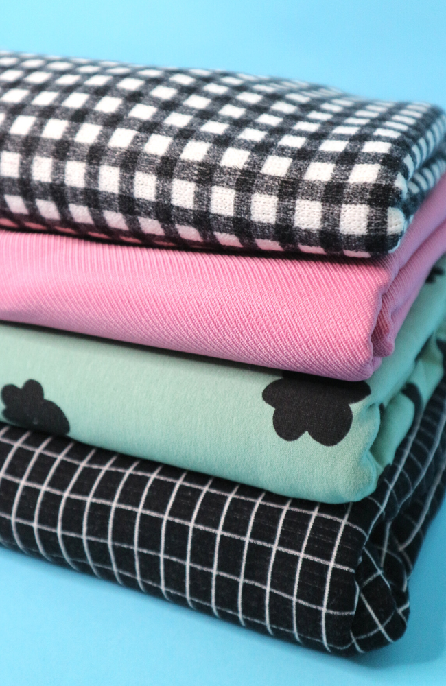 Five Tips For Spring Clean Your Fabric Stash - pile of fabrics