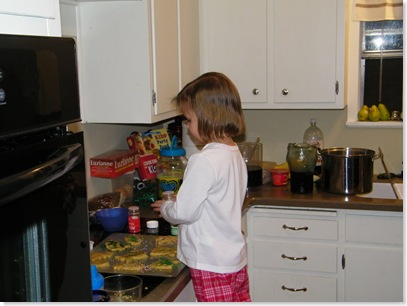 Emma decorating cookies