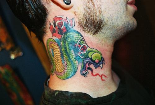 serpent tattoo. Snake tattoos have both