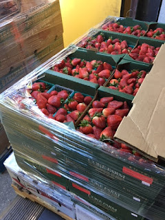 strawberries in boxes