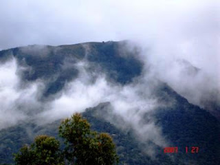 Cloud eating the mountain at Top Station