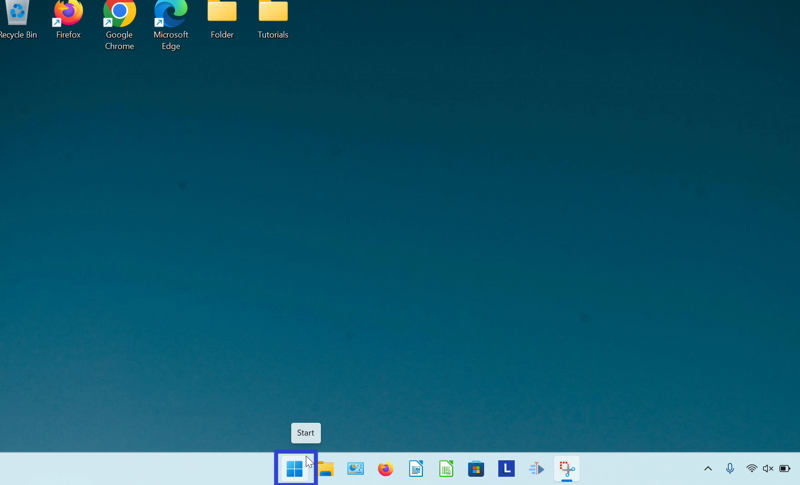 The cursor clicks the "Start" or four blue squares button in the lower left of the taskbar at the bottom of the computer screen.
