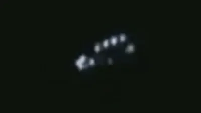The strangest UFO Orbs flying around a Disk UFO.