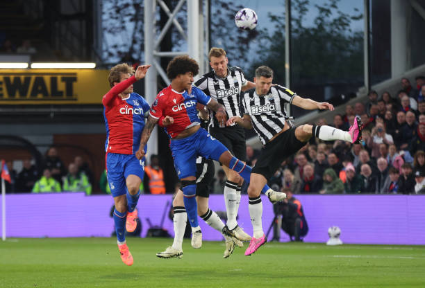 Crystal Palace's Chris Richards challenges Newcastle United's Dan Burn