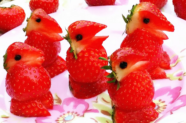 animal figure made out of  strawberry