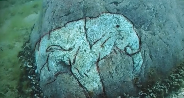 Валун с выгравированным на камне доисторическим изображением мастодонта