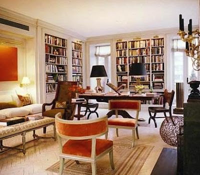 White living room + orange and green accents, interior design