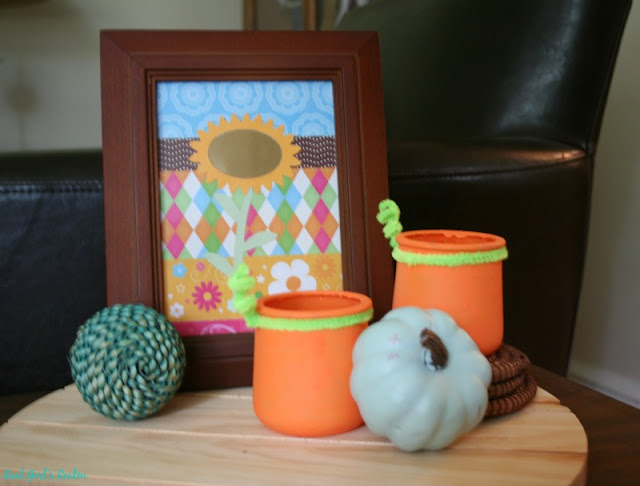 I am partnering with Curly Crafty Mom and Mom Home Guide to bring you 3 ways to re-purpose these glass jars! I decided to make my glass jars into pumpkin votive holders.