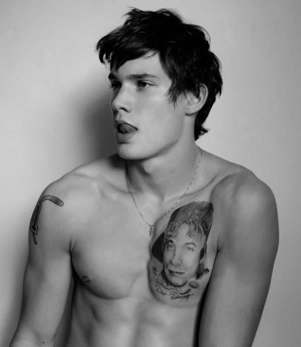 tattoos for men on chest words. We've spotted two tattoos on the body of Joey Kirchner, which include a pair 