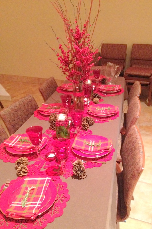 For the main centerpiece a tall cylinder vase was filled with red dogwood