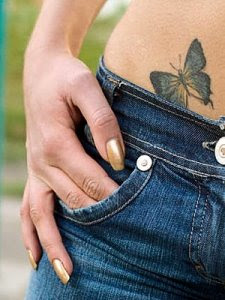 women and butterfly tattoo