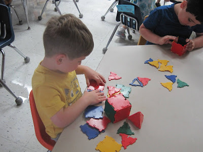 boy playing iwth blocks