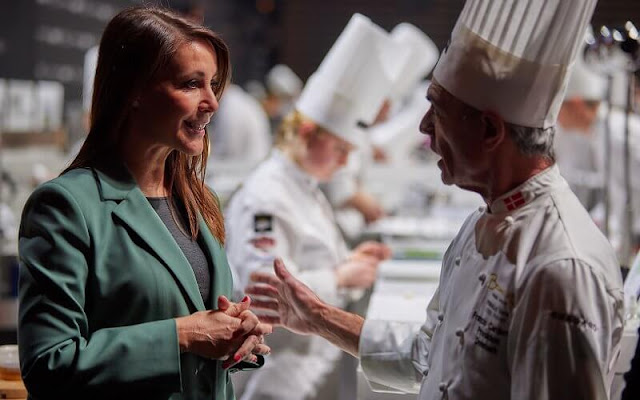 Princess Marie wore a new green blazer, suit, by Maje, and green tailored trousers by Maje Paris. Danish chef Brian Mark Hansen