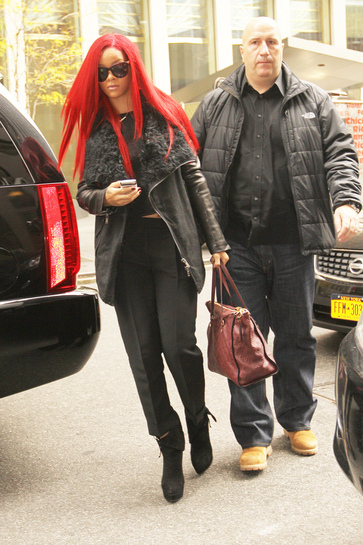 rihanna red hair long. Rihanna#39;s bright red hair,