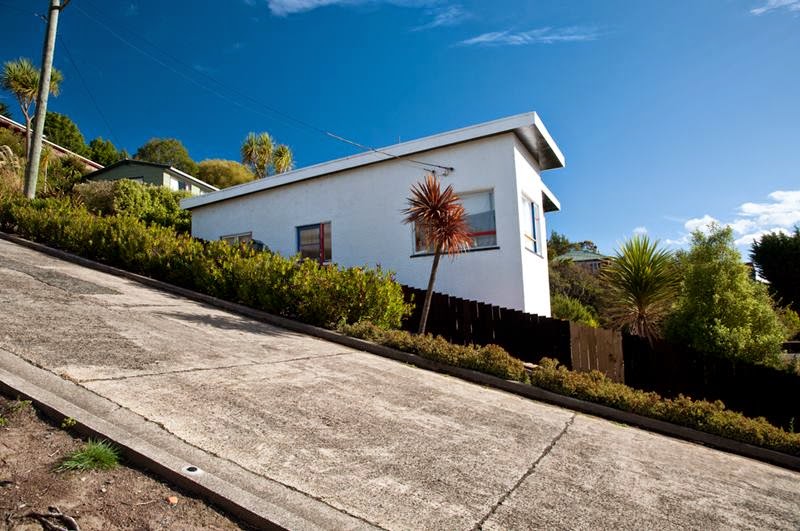 The world's steepest urban street, Baldwin Street, in Dunedin, New Zealand. Its slope reaches 35 percent or 19°, Which means that the distance 2.86 meters road rises by one meter. Baldwin Street is located in the North East Valley. 