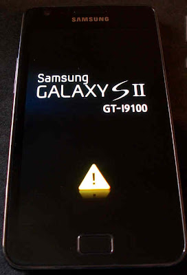 remove yellow triangle on galaxy s2