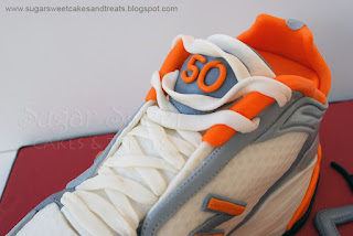 Close up view of fondant laces on Running Shoe Cake