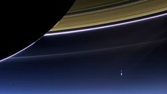 Earth seen from behind rings of Saturn