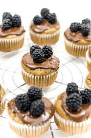 Vegan banana muffins with chocolate and blackberrys center focus