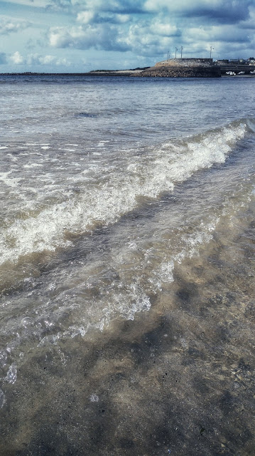 waves on the beach, pier at the back