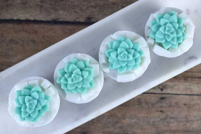 Need soap inspiration?  Make these adorable succulent soaps!  These make a cute soap gift or make them for yourself.  Soap making without lye.  How to make soap succulents.  Making soap recipes and creative ideas.  Diy soap making at home.  Soap making ideas with melt and pour soap.  #diy #soap #meltandpour #succulent