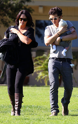 Orlando Bloom out with baby Flynn