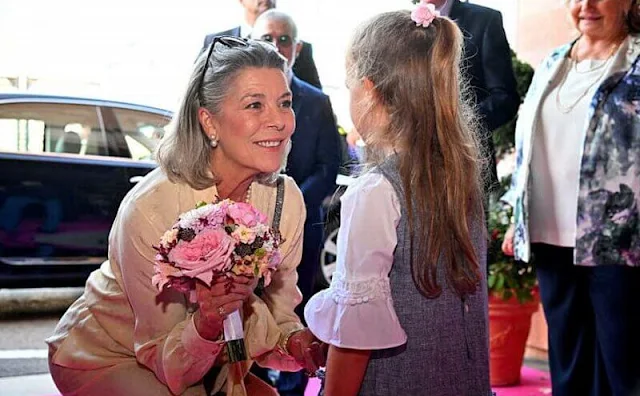 Princess Caroline of Hanover wore a silk blouse and skirt by Chanel. Princess Caroline, president of the Garden Club