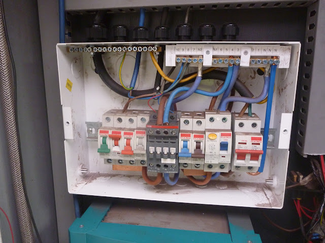 The primary consumer unit serving all 240v AC circuits, in the electrics cabinet in Jim