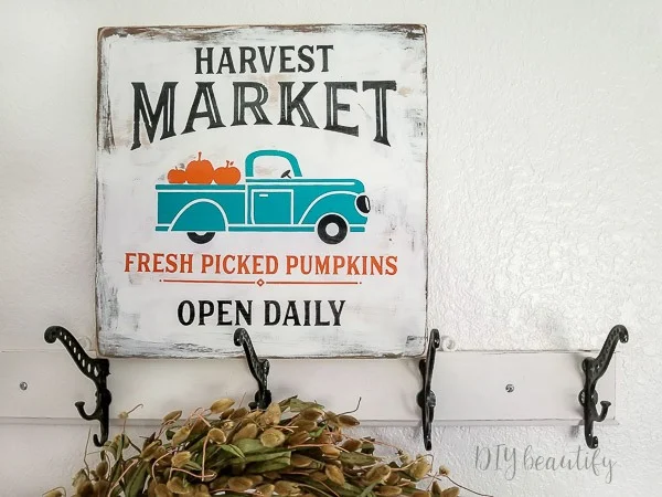 DIY farmhouse fall sign with pumpkins