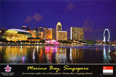 The north shore of Marina Bay, with Esplanade-Theatres  on the Bay, Marina Centre and Singapore Flyer