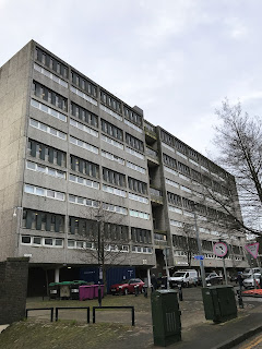 A photo showing Linksview House, a large concrete block of flats in the Brutalist style.  The building is a grey that melds into the grey skies above.  Photograph by Kevin Nosferatu for the Skulferatu Project.