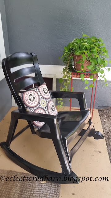 Updated plastic rocking chair with pillow