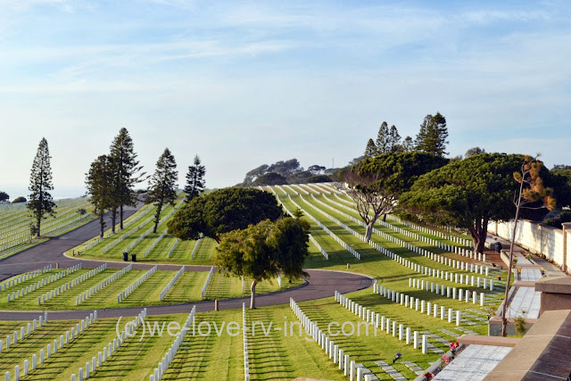 Rows and rows of white headstones show the final resting places of thousands of veterans