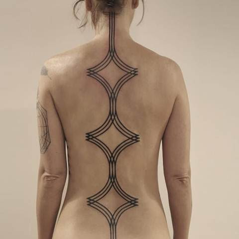 19 Awesome Spine Line Tattoos