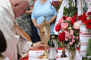 Corpus Christi: Originating in 1263 with a Eucharistic miracle witnessed by Fr. Peter, furthered by St. Juliana's visions and St. Thomas Aquinas hymns