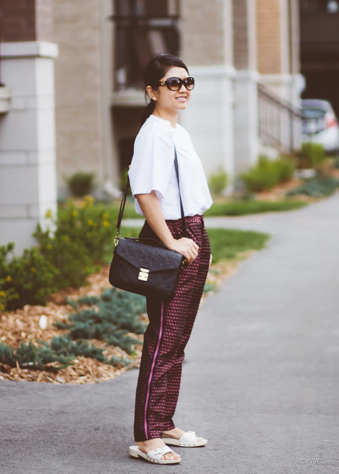 Zara pants with side stripes_uniqlo oversized white tee_coach bleeker sandals_gucci sunglasses_louis vuitton pochette metis in black empreinte leather