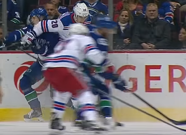 Chris Kreider elbows Elias Pettersson in face