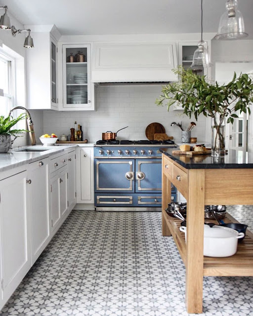 white kitchen cabinets ideas with patterned tile floor