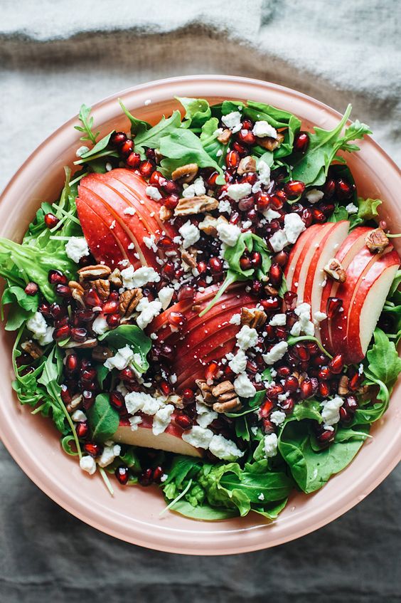 Apple Pomegranate Harvest Salad - A delicious fall salad with greens, apples, and pomegranates with balsamic vinegar. An easy healthy salad and the perfect Thanksgiving side dish! | asimplepalate.com #asimplepalate #fallsalad #thanksgivingsalad #sidedish #salad #thanksgiving