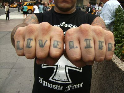 Live life knuckle tattoo.