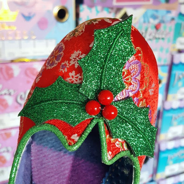 close up of sparkly holly on front of shoe