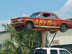 old red car on pole