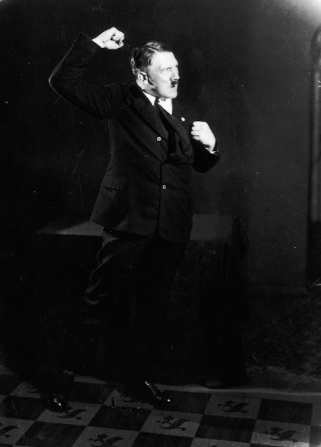 Adolf Hitler poses photographed by Heinrich Hoffmann worldwartwo.filminspector.com