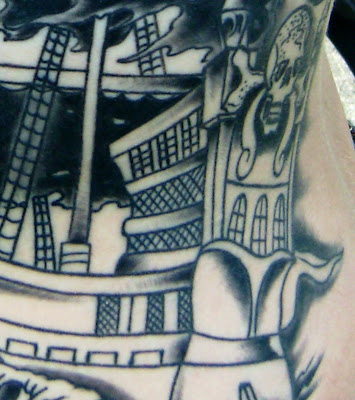ship tattoo. this is a pirate ship.