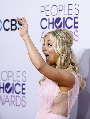 Kaley Cuoco wearing short pink Christian Siriano dress walked the red carpet at People's Choice Awards in LA