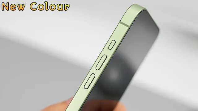 Close-up image of a hand holding a green iPhone 17, highlighting its sleek aluminum frame, volume buttons, and flat-edge design in sharp focus.