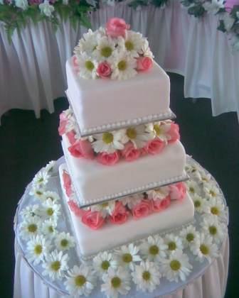 White and pink wedding theme This wedding cake was ordered by Myra of Tmn 