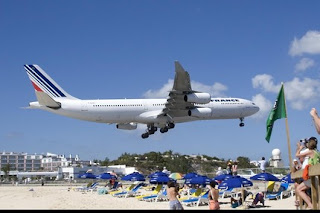 funny fridays photos low flying air france plane on beach